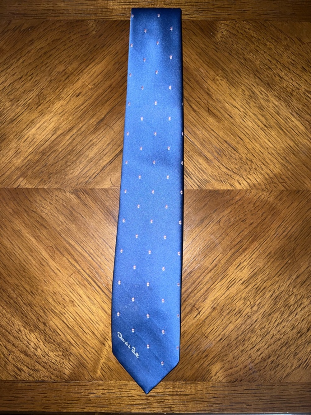 Oscar de la Renta blue polka dot tie with front embroidered logo